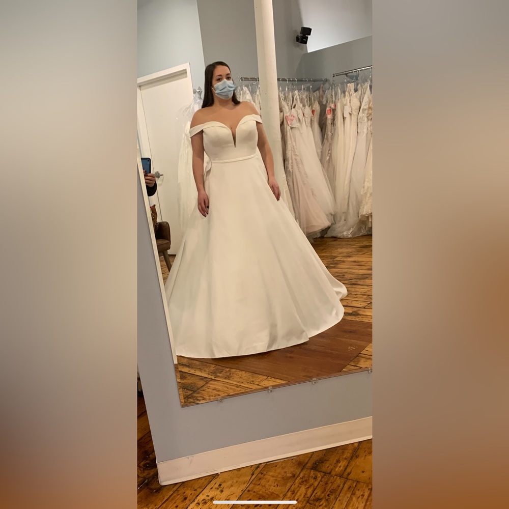 Brand new never worn, never altered wedding dress